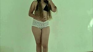 Hot Latina in wet panties shows off her ass and pussy