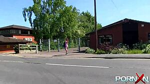 African-American inked redhead urinates in the open