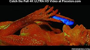 Glow-in-the-dark goddess gets down on her knees