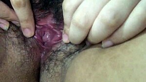 Pretty woman showing off her small and beautiful vagina in a homemade video.