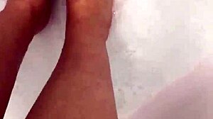 Steamy shower scene with foot fetish action