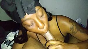 Deep throat and gagging with a tattooed ebony