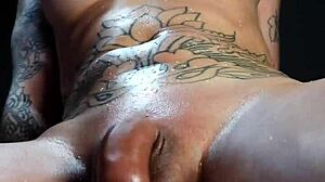 Pretty shemale with pink hair squirts on webcam