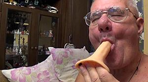 A gay porn video with a grandfather and a young stud in a solo scene