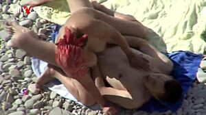 curvy milf caught giving head on beach in public