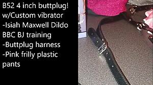 The sissy prepares himself for selfbondage, spreading his legs with a dildo
