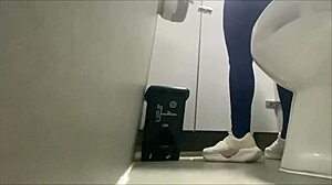 Amateur Camera Captures Voluptuous Chicks in Public Gym Bathroom